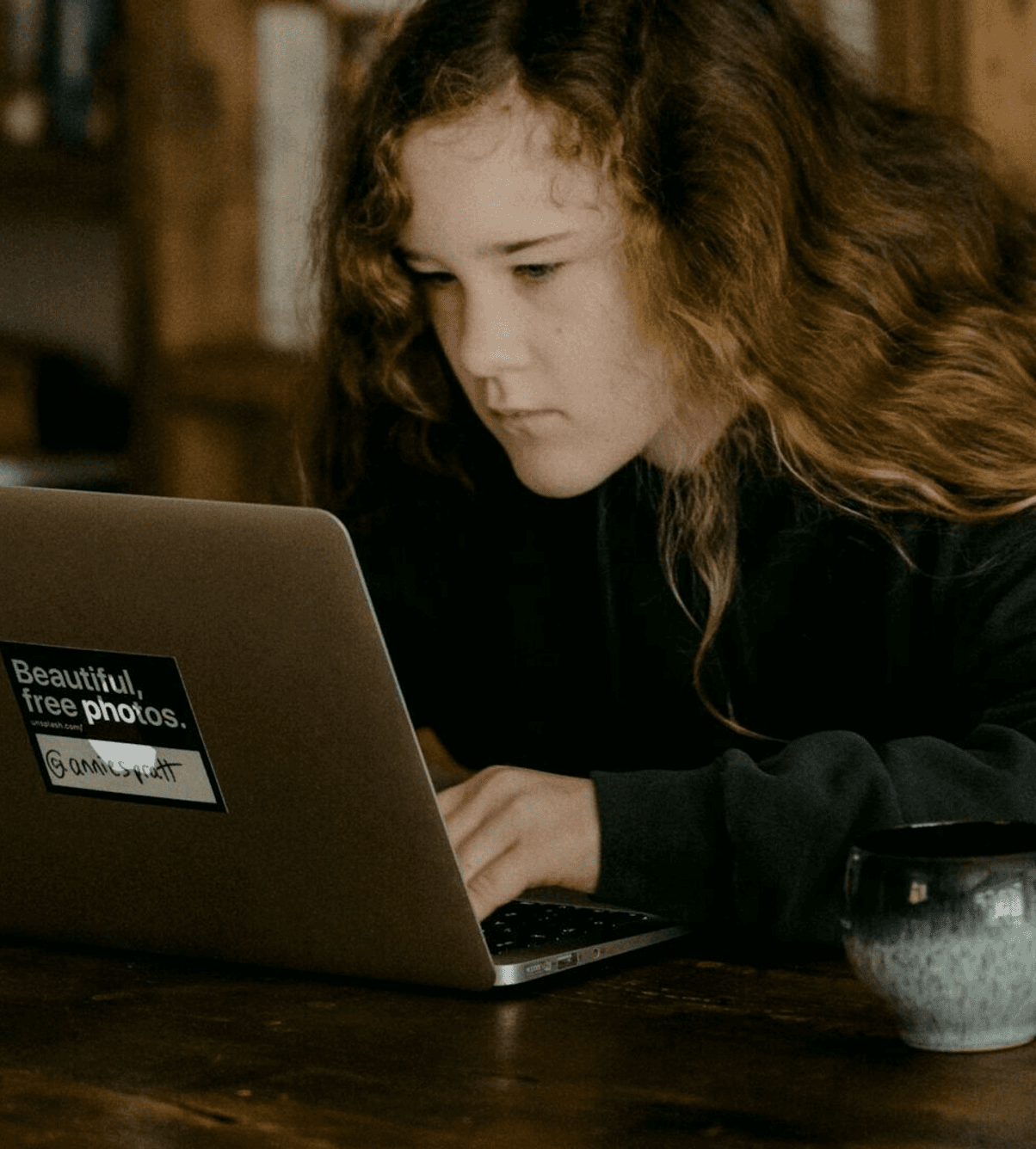 Young girl working with a computer